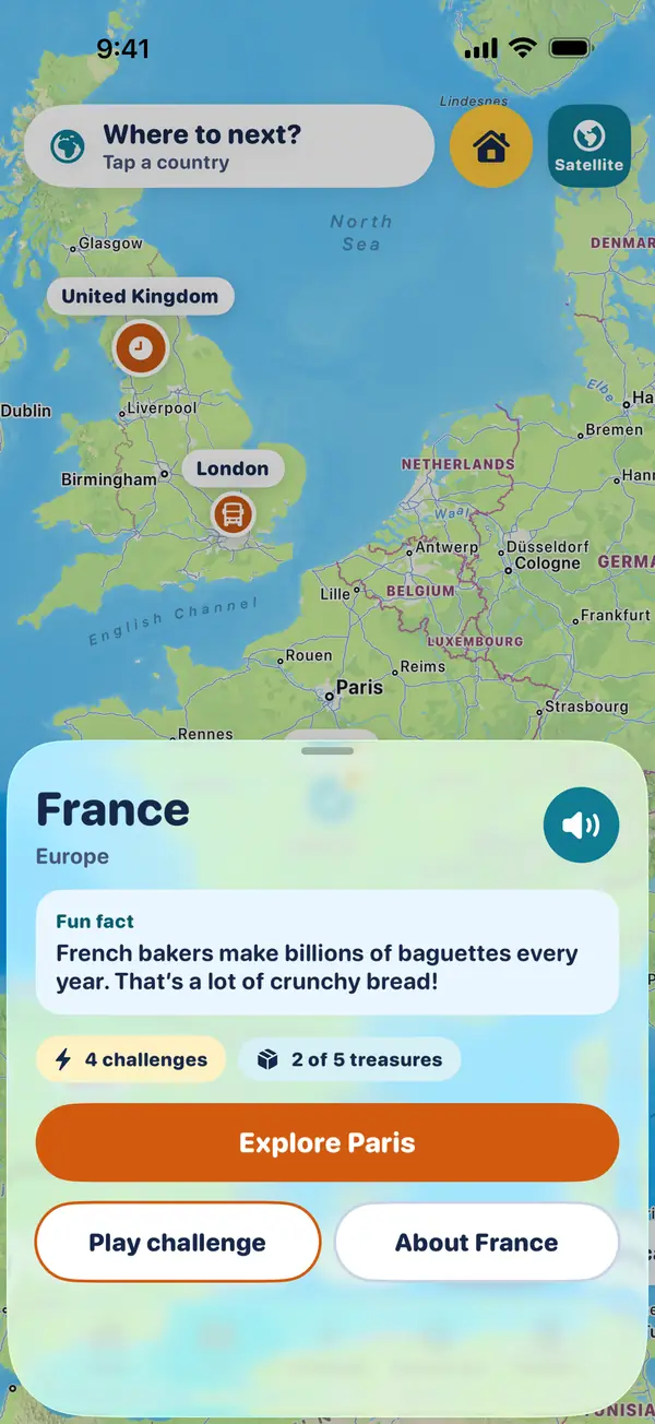 A map of the United Kingdom and France with the France card open, showing a fun fact about baguettes and buttons for Explore Paris, Play challenge and About France.